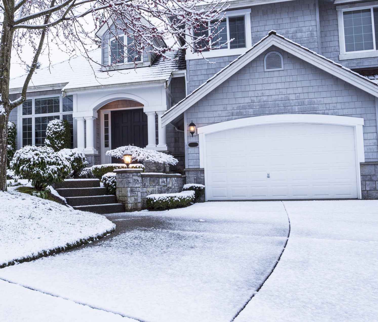protect your asphalt concrete driveway in the winter